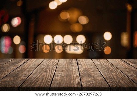 View of empty rustic wooden tabletop with bokeh background