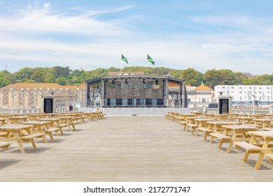 A View Of The Empty Stage On Hastings Pier, Sussex, United Kingdom On 16 JUNE 2022, Stage Set Up For Performances By Musical Groups, No People And Space For Text