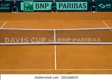 View Of Empty Tennis Clay Court And Text Davis Cup By Paribas And Judges In Background 