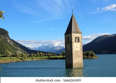 A view of the enchanting Lake Resia in the Friuli Alps in Italy - Shutterstock ID 1666261459
