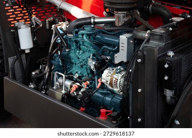 View of the engine and cooling radiator. The work of agricultural machinery and farmers. New model of agricultural equipment.