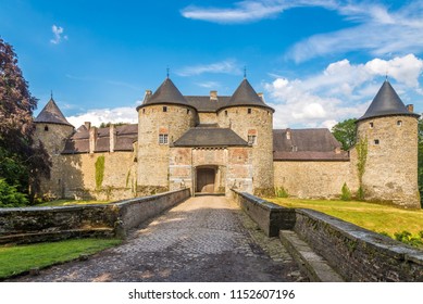 View at the entrance to Castle of Corroy le Chateau in the province of Namur, Belgium  - Shutterstock ID 1152607196
