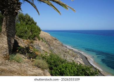 View of Esquinzo Beach, Playa de Esquinzo, on the Atlantic Ocean coast in October. Esquinzo, Fuerteventura, Las Palmas, Canary Islands, Spain. - Powered by Shutterstock