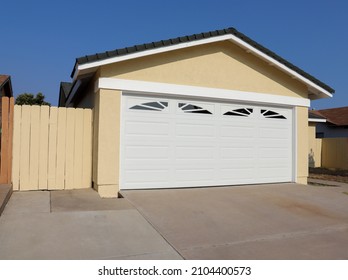 View Of The Exterior Front Of A House After Being Painted. Before And After Painting.