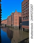 View of famous Hamburg Speicherstadt warehouse district on a sunny day in summer, Hamburg, Germany