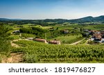 View of famous wine region Goriska Brda hills in Slovenia. Panoramic photo of villages of Gorica Hills with vineyards and grapevine covering hills. Agricultural wine region of Slovenia.