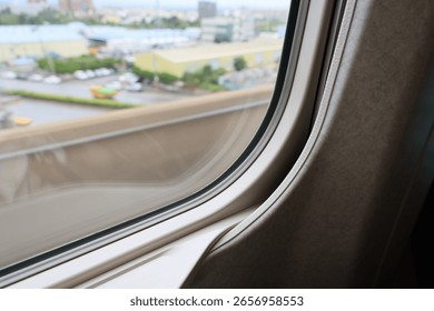 View from a fast-moving train window with motion blur.