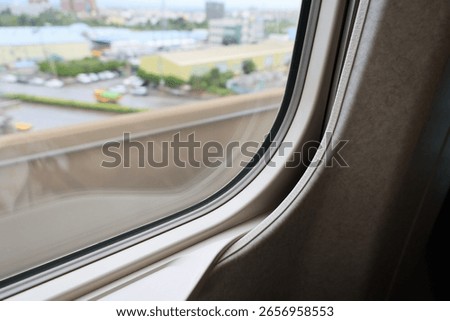 View from a fast-moving train window with motion blur.