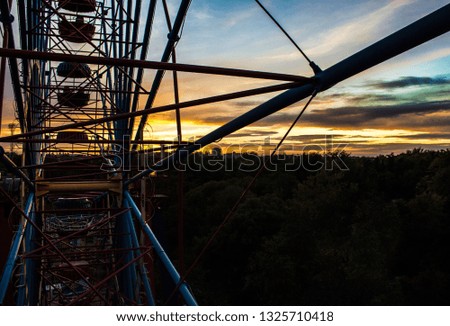 View from the ferris wheel at sunset.
Ride on a ferris wheel.