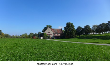 View of the field and a distant building