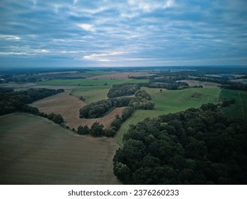 View of fields and forests from above.