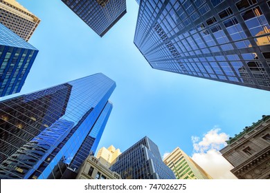 Up view in financial district, Manhattan, New York - Shutterstock ID 747026275