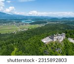 View of the Finkenstein castle ruins and lake Faaker See near Villach in Carinthia