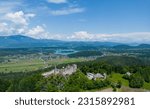 View of the Finkenstein castle ruins and lake Faaker See near Villach in Carinthia