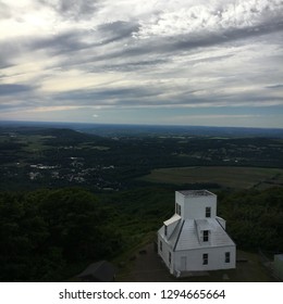 A View From A Fire Tower Looking Passed A Church And Over The Hudson River Valley 