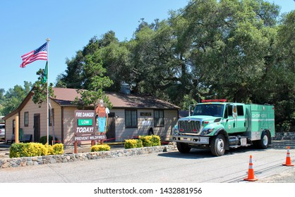 View Of A Firefighter Rescue Vehicle Parked Next To A Firehouse In Trabuco Canyon California