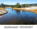 View of the Firehole River as it meanders through the Upper Geyser Basin in Yellowstone National Park