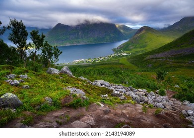 View of the Fjordgard village from Hesten trail to the Segla mountain on Senja island in northern Norway. This village is located in the Oyfjorden at the northwest coast of Senja.