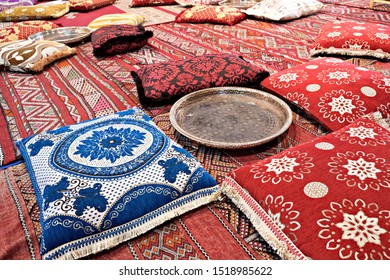 View Of The Floor Of An Arabic Tea Room With Carpets And Cushions