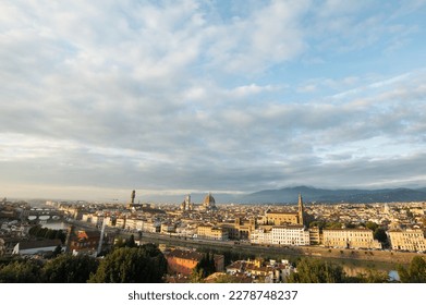 View of Florence Cathedral (Cattedrale di Santa Maria del Fiore) and rest of Florence from Michelangelo plaza at sunset. Fish eye lens. Panoramic view of Florence, Tuscany, Italy