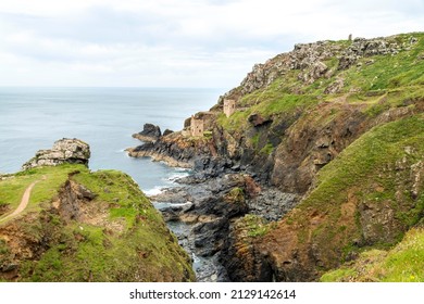 View from flower covered clifftop,UNESCO World Heritage site,on a calm summer day on the dramatic north Cornish coast,a popular National Trust holiday,tourist and clifftop walks destination.
