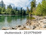 A view of the flowing Snoqualmie River in washington State.