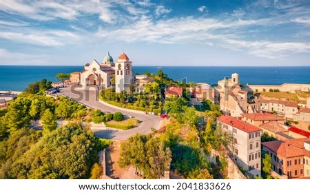 View from flying drone of Cattedrale di San Ciriaco church and San Gregorio Illuminatore - Catholic church. Spectacular summer cityscape of Ancona town, Italy, Europe. Traveling concept background.