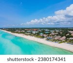 View from a flying drone of the luxury beach against the background of the beauty of the sea with coral reefs. Top view. Playa del Carmen, Mexico