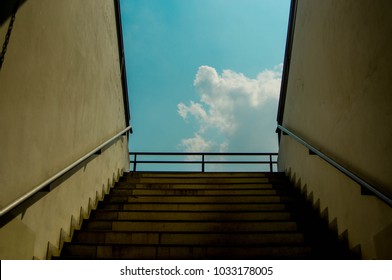 View of the football field from the tunnel overlooking the blue sky. - Powered by Shutterstock