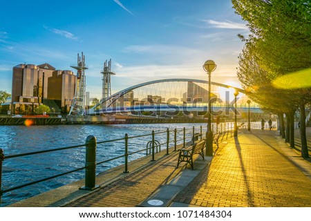 View of a footbridge in Salford quays in Manchester, England
