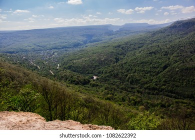 View of the forest and the village from the top of the mountain, Russia, Mezmay - Shutterstock ID 1082622392