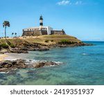 View of the fortified Farol da Barra (Barra Lighthouse), signaling the entrance to the Bay of Salvador, Bahia, Brazil