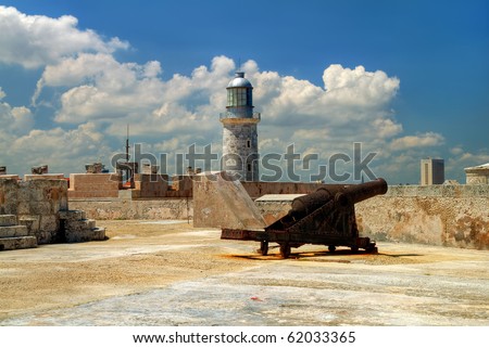 View of the fortress of El Morro in Havana, Cuba depicting the lighthouse and an ancient cannon