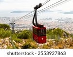 View of French city Toulon from Mount Faron. Cable car to mount in foreground.