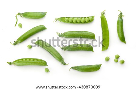 To view of fresh green pea pods and peas on the white background
