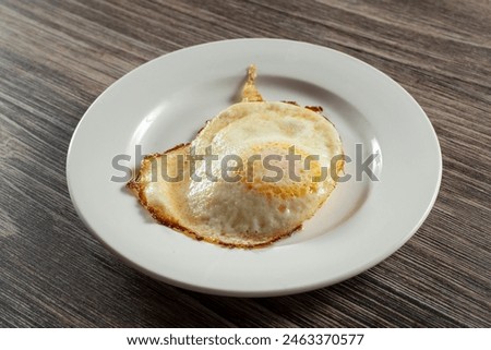 A view of a fried egg.