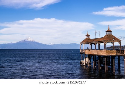 View of Frutillar, its dock in the llanquihue lake and the volcano  - Shutterstock ID 2151076277