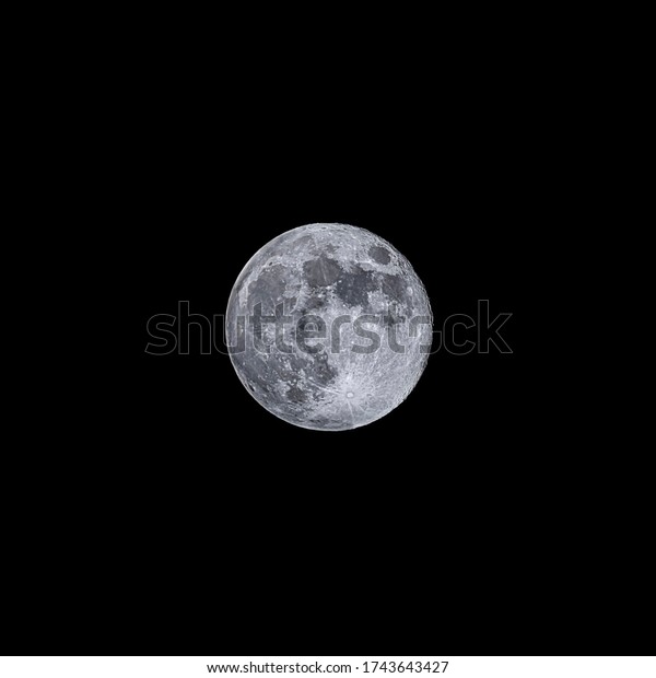 View at
Full moon on a black sky as the
background