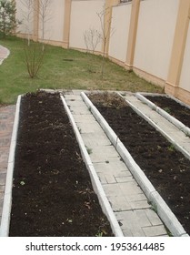 View Of  Garden Beds For Planting Vegetables In Early Spring. Home Gardening Concept. Sweden.