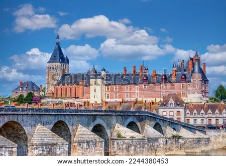 View of Gien with the castle and the old bridge across the Loire - France, Loiret.