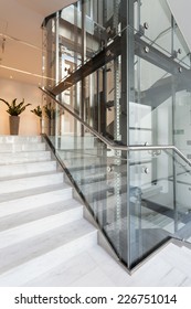 View Of Glass Elevator In Modern Building