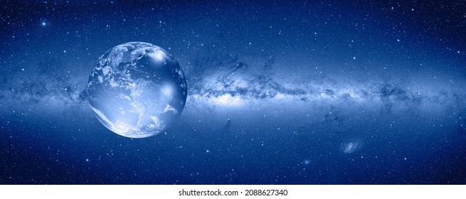 View of the glass globe planet Earth from space during a sunrise Milkyway galaxy in the background 