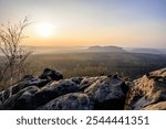 view from gohrisch in the saxon switzerland during autumn sunrise, germany