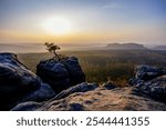 view from gohrisch in the saxon switzerland during autumn sunrise, germany