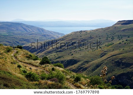 A view of the Golan Heights from Umm al-Qantir to the west in the background shows the Sea of Galilee