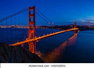 A view of the Golden Gate Bridge with the city of San Francisco skyline in the background and the bay. - Powered by Shutterstock