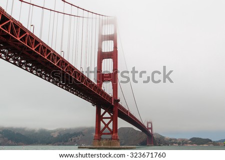 View of Golden Gate Bridge in SanFrancisco, a day of clouds and thick fog