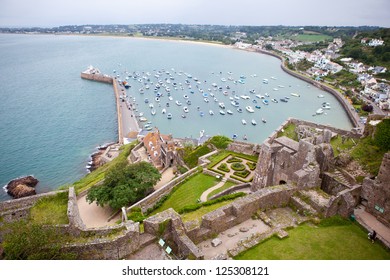 View of Gorey Harbour, Mont Orgueil Castle, Jersey Channel Islands. Located in the East of the island, one of the three main harbours in Jersey.
