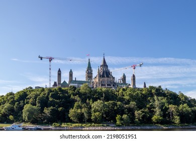 View Of The Government Buildings On Parliament Hill From The Ottawa River In Ontario, Canada