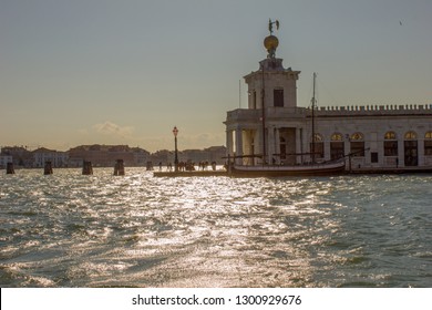 View from the Gran Canal of Punta della Dogana (or Salute or De Mar) and Palla d’oro (Golden sphere), Venice, Italy 04/10/2018.  Canale della Giudecca.
